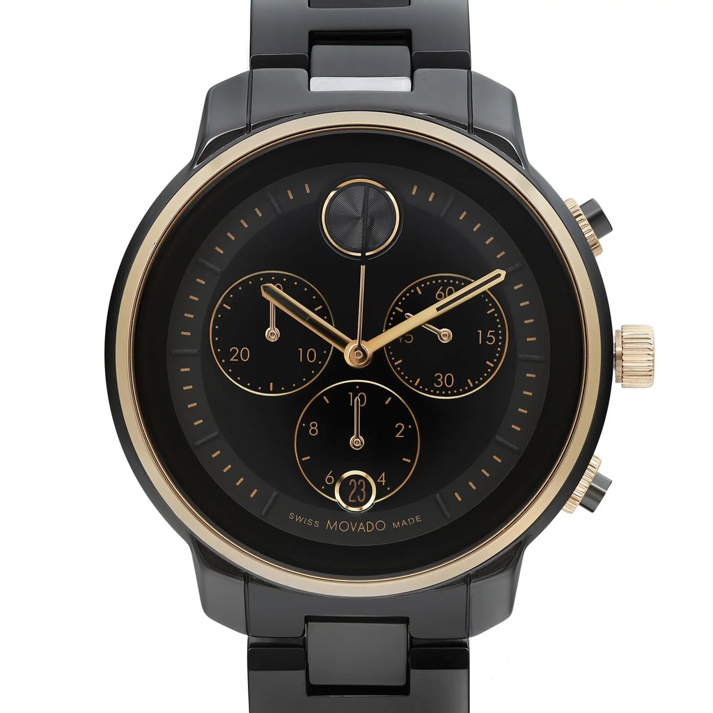 An image of a pre-owned wristwatch taken from a front close-up angle, showcasing the watch face. The watch features a black dial with gold-tone hands and markers, along with three subdials and a date display. The case and bracelet are also visible, highlighting a polished finish.