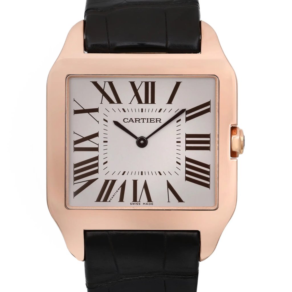 An image of a pre-owned wristwatch taken from a front close-up angle, highlighting the watch face. The watch features a square-shaped case with a rose gold tone and a white dial displaying black Roman numerals. The brand name is centered on the dial. The strap attached is black, and the overall condition appears well-maintained.