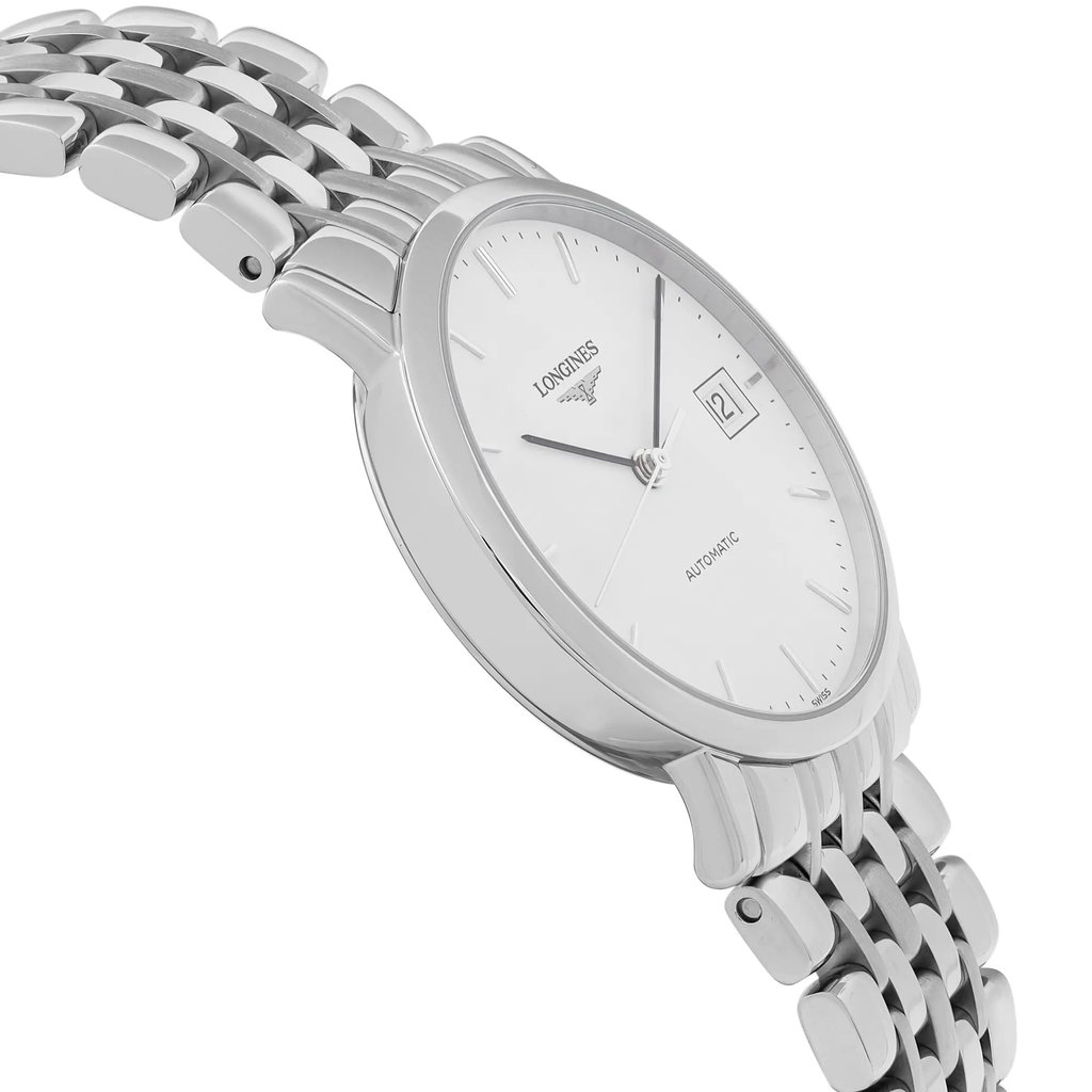 An image of a wristwatch taken from a side profile view, opposite of the crown, displaying the sleek design of the watch face and linked bracelet. The watch is positioned at an angle, highlighting its silver-toned finish and detailing, with a focus on the simplicity of its white dial and date display. The photograph is taken at a close distance, showcasing the watch as a display model.