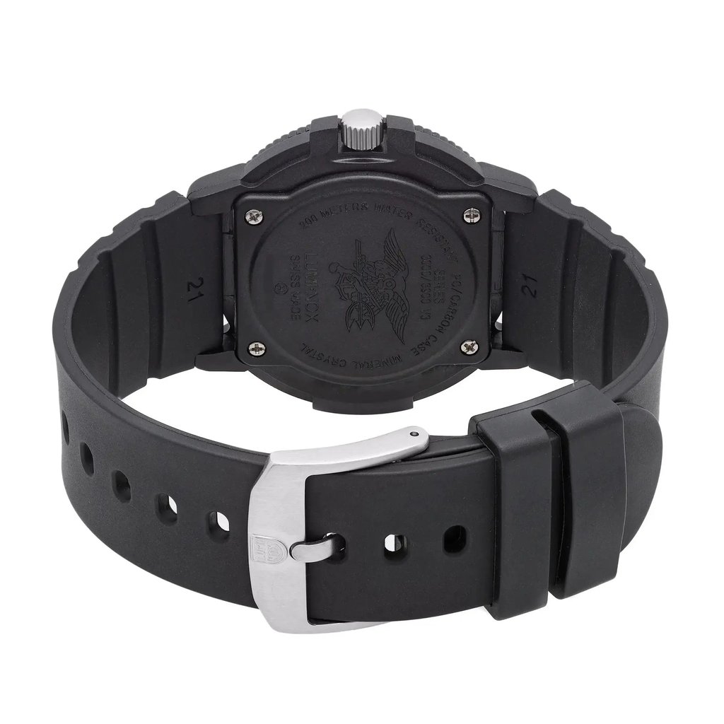 An image of a Wristwatch by Luminox. This Pre Owned item is designed for Men, featuring a Casual,Classic,Diver,Military style. It has a Quartz movement and an Analog display with a Black dial color. The indices include 12-Hour Dial,Arabic Numerals,Easy to Read/Large Numerals. The band is made of Rubber and the case is made of Carbon. The watch has a Round shape with a case size of 44 mm and a case thickness of 12 mm.