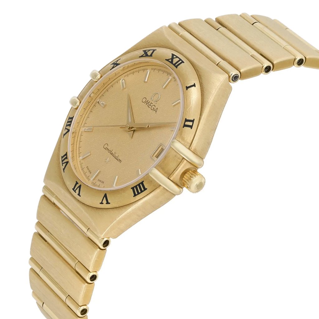 An image of a pre-owned wristwatch taken from a side profile view, highlighting the crown on the right side. The watch features a gold-tone case and bracelet, with Roman numeral hour markers on the bezel. The angle showcases the watch at a slight tilt, emphasizing its sleek design and metallic finish, captured from a close distance.