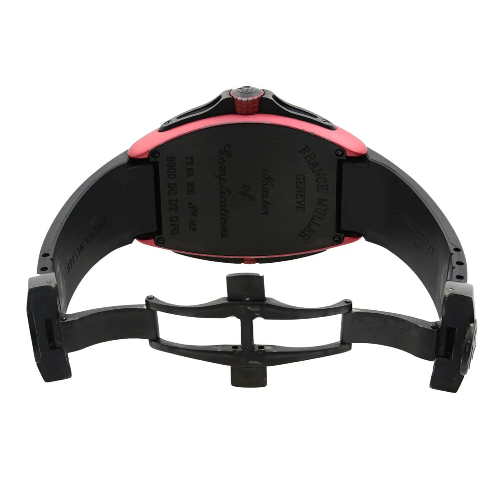 An image of a pre-owned wristwatch taken from the back view, showcasing the open clasp. The watch is positioned upright, with the back case prominently displaying engraved text. The image is taken from a slight angle, providing a clear view of the entire back and clasp mechanism, with the watch being centered and at a close distance to highlight details.