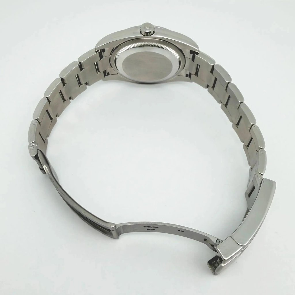 Back View Of Screwback Back Case And Open Stainless Steel Band Of Rolex 116000 Watch Pre Owned Condition