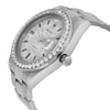An image of a pre-owned wristwatch viewed from the side profile, showcasing the crown prominently. The watch features a silver-tone bracelet and a sparkling bezel. The watch face is textured with metallic accents and hour markers. The angle highlights the intricate details and craftsmanship of the timepiece, with the focus on the side and crown, captured from a close distance.