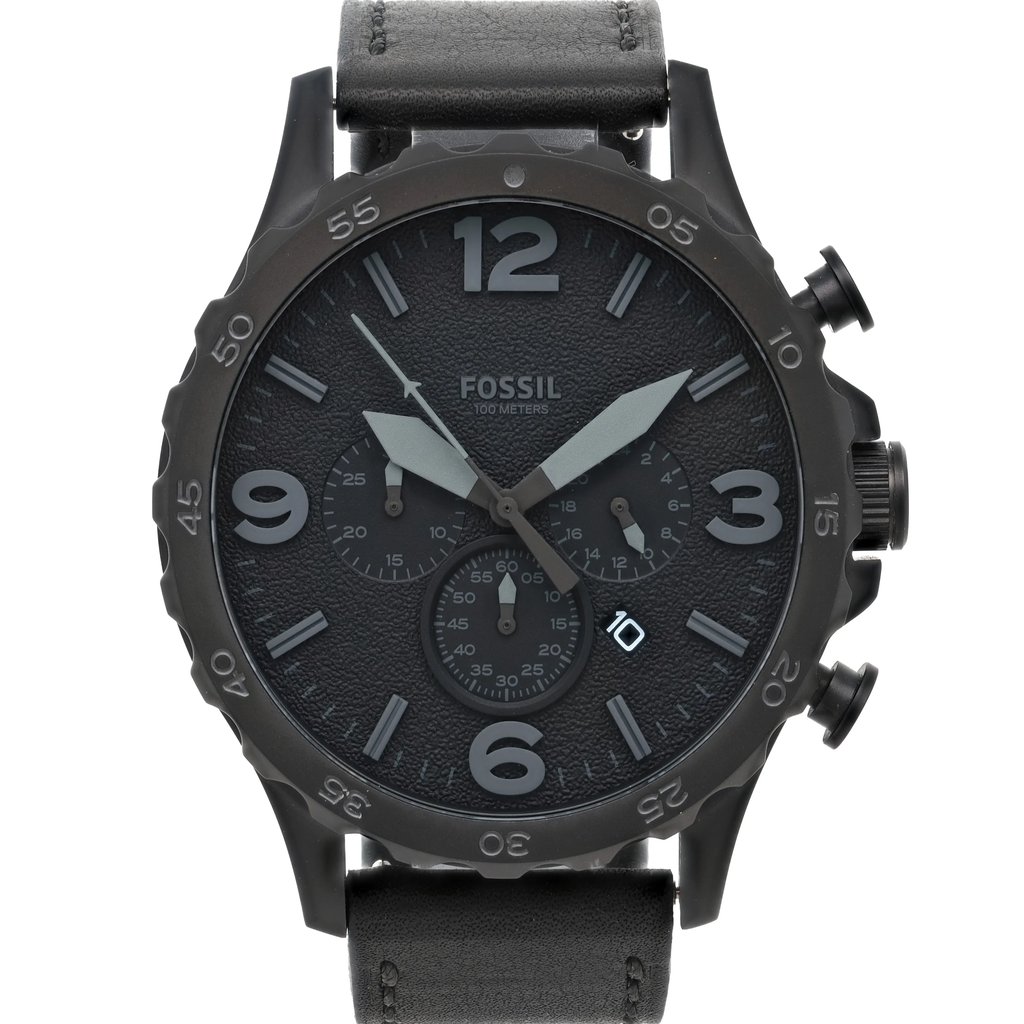 An image of a Fossil wristwatch taken from a straight-on angle, showcasing the large, round black face with bold numerals at the 12, 3, 6, and 9 o'clock positions. The watch features three subdials and a date window at the 4 o'clock position. It has a textured black leather strap and a black bezel with minute markings. The watch is new with defects and is positioned centrally in the frame, captured at a close distance for detailed visibility.