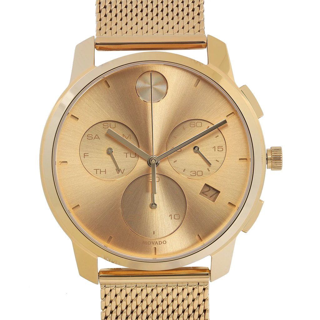 An image of a wristwatch captured in a front close-up shot, highlighting the watch face. The watch has a gold-toned dial with three sub-dials and a date window. The hands and hour markers are elegantly designed, complementing the overall aesthetic. The watch is new but has defects, as indicated in the description. The mesh bracelet adds a sophisticated touch to the design.