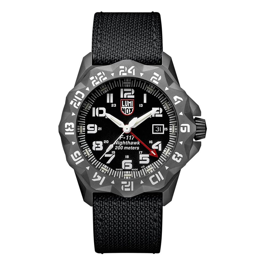 An image of a Wristwatch by Luminox. This Pre Owned item is designed for Men, featuring a Military style. It has a Quartz movement and an Analog display with a Black dial color. The indices include 12-Hour Dial,Arabic Numerals,Easy to Read/Large Numerals. The band is made of Kevlar and the case is made of Stainless Steel. The watch has a Round shape with a case size of 44 mm and a case thickness of 13 mm.
