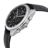 An image of a Wristwatch by Tissot. This Display Model item is designed for Men, featuring a Casual style. It has a Quartz movement and an Analog display with a Black dial color. The indices include 12-Hour Dial,Baton Indexes. The band is made of Leather and the case is made of Stainless Steel. The watch has a Round shape with a case size of 41 mm and a case thickness of 11 mm.