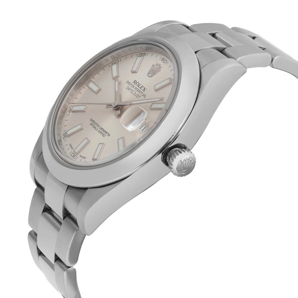 An image of a pre-owned wristwatch viewed from the side profile, showcasing the detailed crown. The watch features a metallic band and a light-colored dial with visible hour markers and hands. The angle highlights the watch face and bracelet, emphasizing the sleek design and craftsmanship.