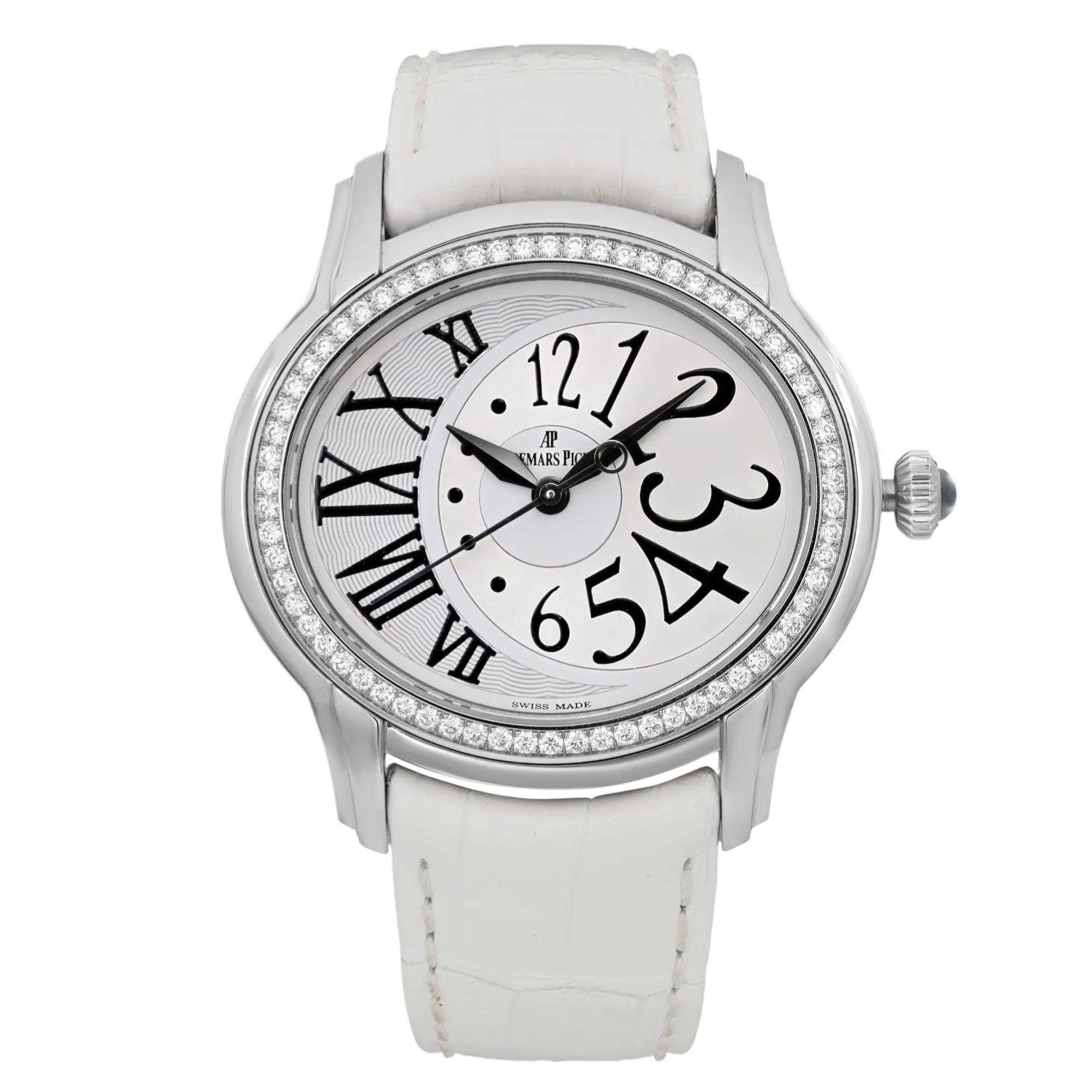 An image of a pre-owned Audemars Piguet Millenary 39mm Steel Diamond Silver Dialwomen's wristwatch. The watch is positioned centrally, facing forward, showcasing its round face and intricate details. The dial features a mix of large Arabic and Roman numerals, with a decorative pattern on the left side. The bezel is adorned with a row of sparkling diamonds, enhancing its elegant appearance. The watch strap is white, complementing the silver-tone case. The image is taken from a close-up angle, capturing the watch's design and craftsmanship.