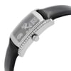 An image of a wristwatch taken from a side profile view, showcasing the crown prominently. The watch features a sleek, rectangular case with a polished finish and a diamond-encrusted bezel. The black leather strap is visible, connecting to the case with a smooth, glossy texture. The angle highlights the elegant curvature of the watch, with the crown positioned centrally and clearly visible. The overall presentation is of a display model in excellent condition, captured at a close distance to emphasize the details.