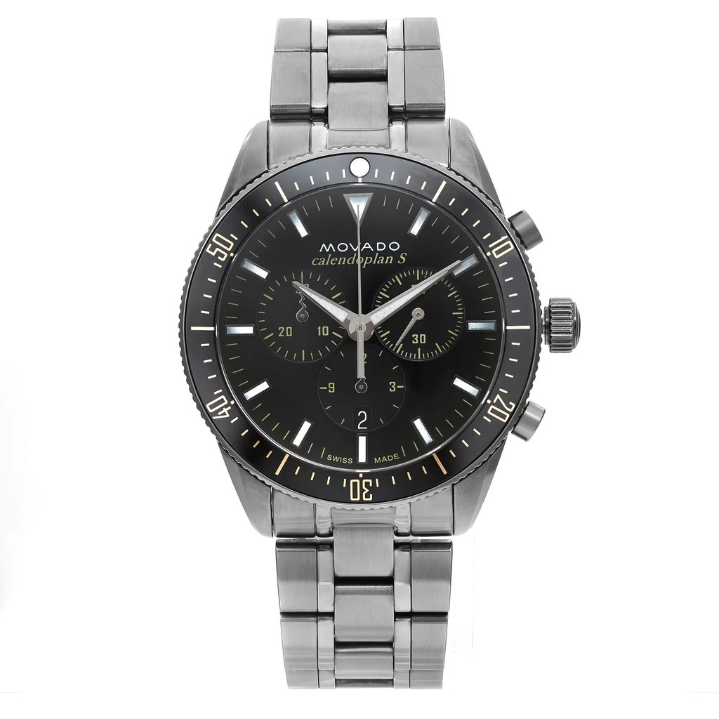 An image of a pre-owned wristwatch taken from a front full frontal view. The watch features a metallic strap and a dark dial with multiple sub-dials. The brand name is visible on the face, which is captured in sharp detail from a close distance. The watch's condition appears to be well-maintained.