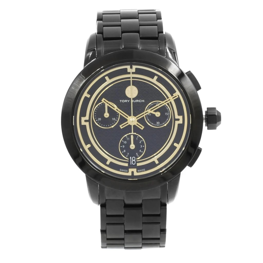 An image of a Wristwatch by Tory Burch. This Pre Owned item is designed for Women, featuring a Casual,Dress/Formal style. It has a Quartz movement and an Analog display with a Black dial color. The indices include Sticks. The band is made of Stainless Steel and the case is made of Stainless Steel. The watch has a Round shape with a case size of 37 mm and a case thickness of 10 mm.