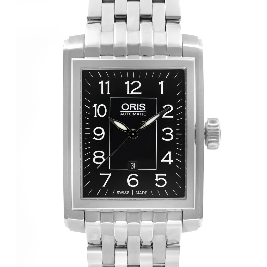 An image of a luxury men's wristwatch by Oris, shown in a front close-up shot focusing on the watch face. The watch features a rectangular stainless steel case and band, with a black dial and steel bezel. It displays Arabic numerals and the time is indicated by sleek hands. The watch is positioned upright, capturing intricate details of its design.