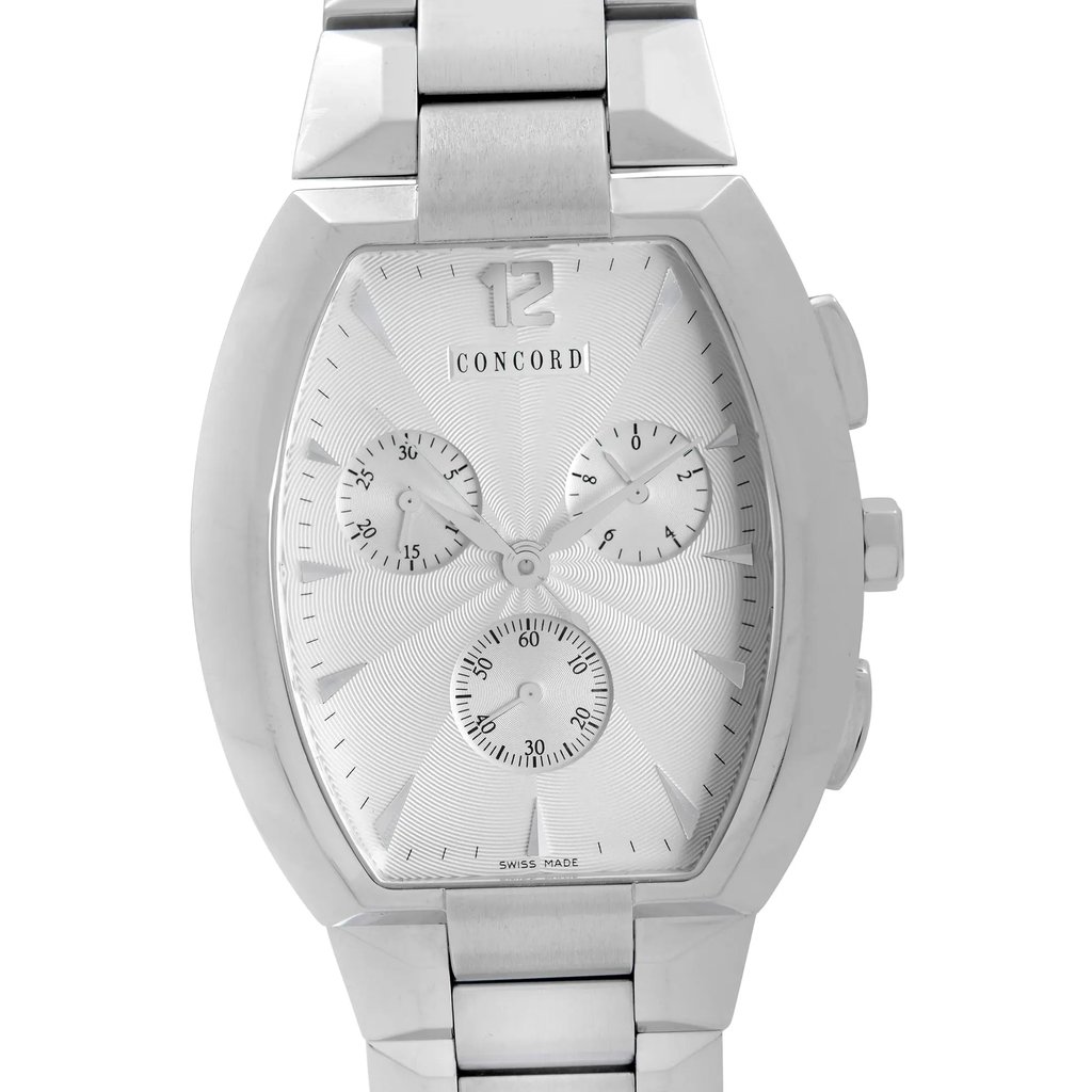 An image of a pre-owned wristwatch taken from a front close-up angle, showcasing the watch face. The watch features a silver-tone design with three subdials and a prominent numeral at the 12 o'clock position. The brand name is visible on the watch face. The metal bracelet is partially visible at the top and bottom of the image.