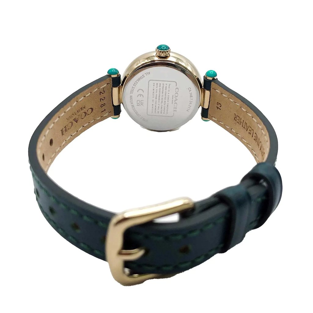 An image of a Wristwatch by Coach. This Display Model item is designed for Women, featuring a Dress/Formal style. It has a Quartz movement and an Analog display with a Silver dial color. The indices include 12-Hour Dial,Arabic Numerals. The band is made of Leather,Calfskin and the case is made of Stainless Steel. The watch has a Round shape with a case size of 26 mm and a case thickness of 8 mm.