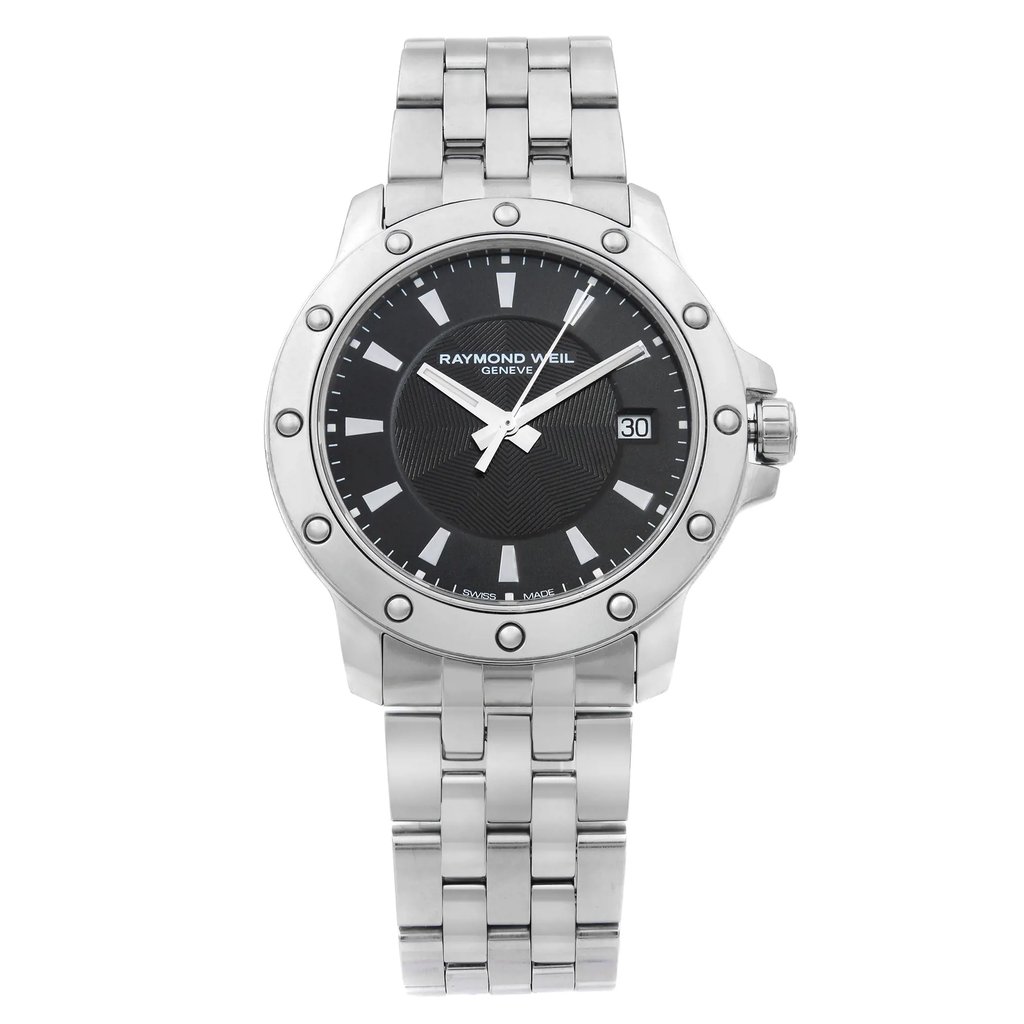 An image of a Wristwatch by RAYMOND WEIL. This Pre Owned item is designed for Men, featuring a Dress/Formal style. It has a Quartz movement and an Analog display with a Black dial color. The indices include 12-Hour Dial,Non-Numeric Hour Marks,Stick Indexes. The band is made of Stainless Steel and the case is made of Stainless Steel. The watch has a Round shape with a case size of 39 mm and a case thickness of 8 mm.