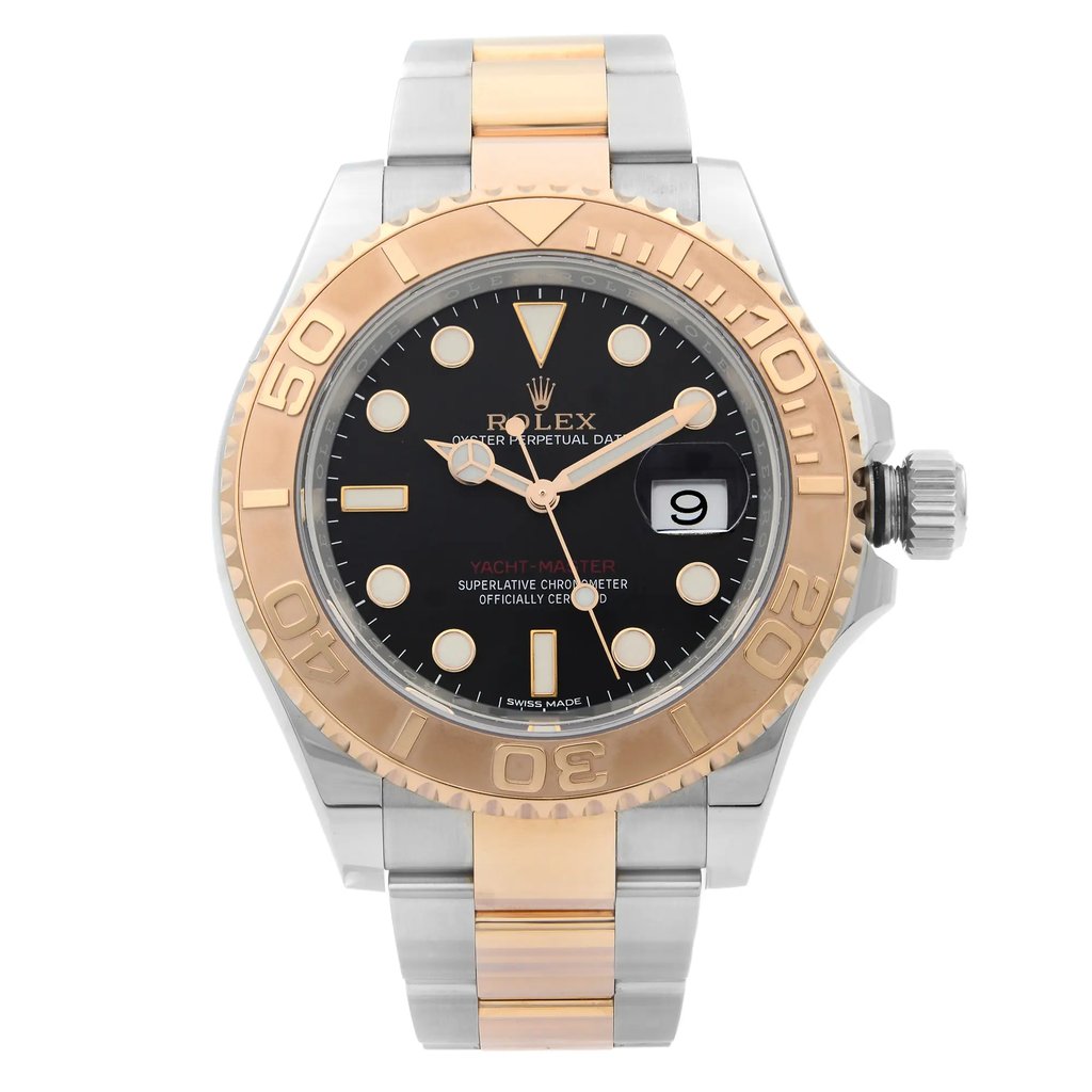 An image of a pre-owned wristwatch shown from a front full-frontal view. The watch features a metallic band with a two-tone design, combining silver and rose gold elements. The bezel is marked with numbers and is rose gold in color, while the dial is black with distinct hour markers and a date window. The watch hands and markers are also highlighted in rose gold. The crown is positioned on the right side. The image is captured at a close distance, focusing on the watch's face and details.