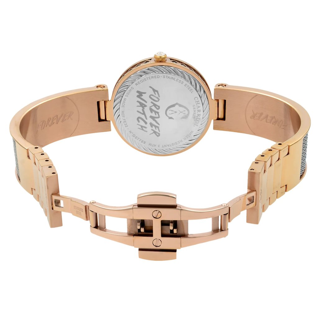 An image of a pre-owned wristwatch viewed from the back, showing an open clasp. The watch is positioned at eye level, with the angle focusing on the back case and band. The distance is close, highlighting the details of the metal clasp and engraved text on the inside of the band.