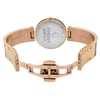 An image of a pre-owned wristwatch viewed from the back, showing an open clasp. The watch is positioned at eye level, with the angle focusing on the back case and band. The distance is close, highlighting the details of the metal clasp and engraved text on the inside of the band.