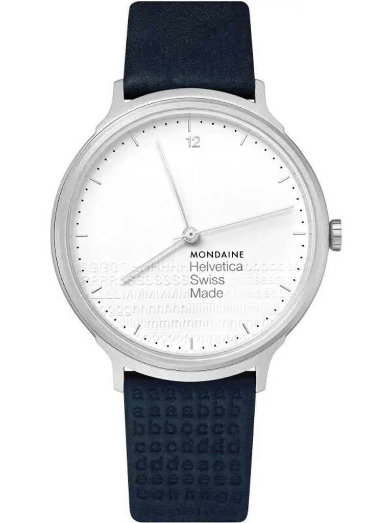 An image of a Wristwatch by Mondaine. This Display Model item is designed for Unisex Adult, featuring a Casual style. It has a Quartz movement and an Analog display with a White dial color. The indices include 12-Hour Dial,Stick Indexes. The band is made of Stainless Steel and the case is made of Stainless Steel. The watch has a Round shape with a case size of 38 mm and a case thickness of 8 mm.