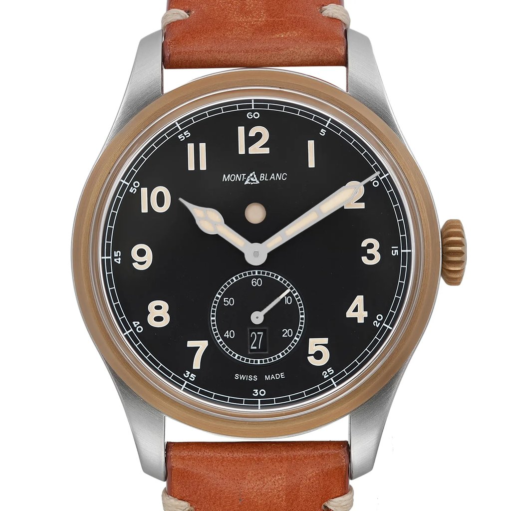 An image of a pre-owned Montblanc men's wristwatch in good condition. The photograph is a front close-up shot of the watch face, capturing it from a direct, frontal angle at a close distance, emphasizing the details. The watch features a round stainless steel case with a gold tone bezel. It has a black dial with Arabic numerals as indices and a 12-hour display. Notable features include luminous hands, a date indicator at the 3 o'clock position, and a small seconds subdial. The band is made of leather, contributing to its casual style.