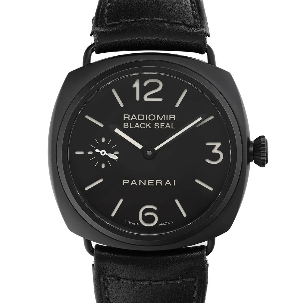 An image of a Wristwatch by Panerai. This Pre Owned item is designed for Men, featuring a Luxury style. It has a Mechanical (Manual) movement and an Analog display with a Black dial color. The indices include 12-Hour Dial,Arabic Numerals,Stick Indexes. The band is made of Leather and the case is made of Ceramic. The watch has a Cushion shape with a case size of 45 mm and a case thickness of 13 mm.