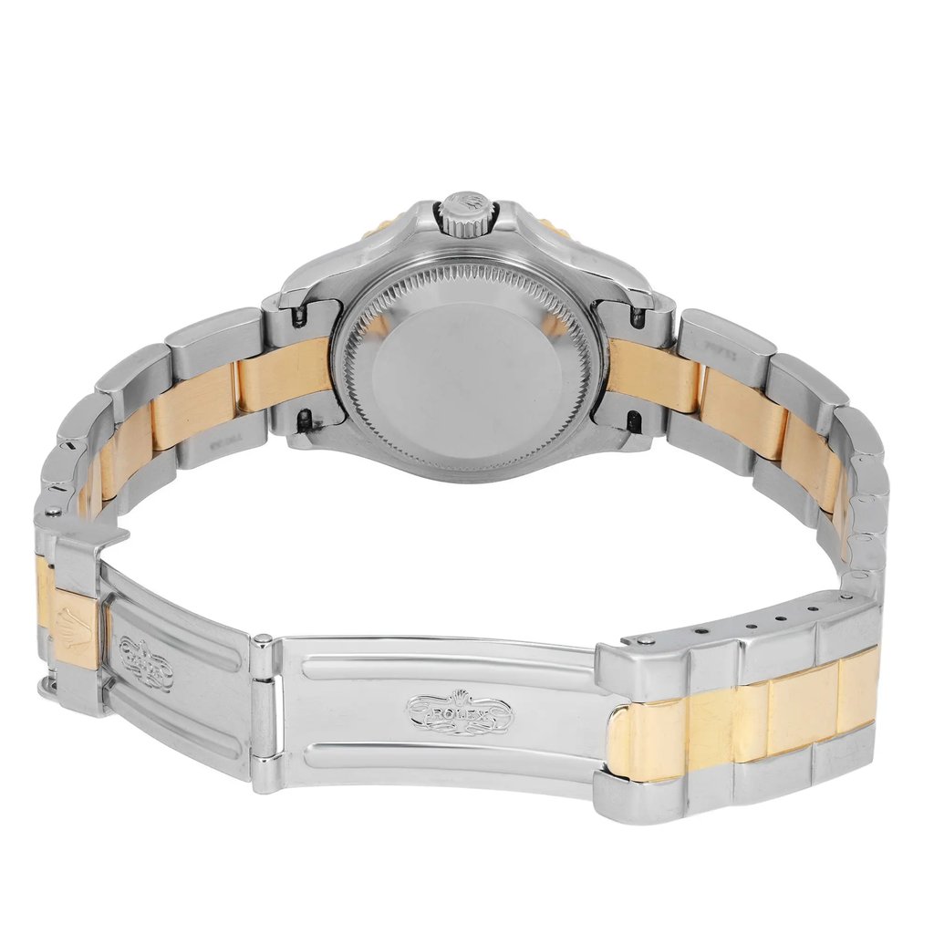 An image of a pre-owned wristwatch showcasing the back view with an open clasp. The watch features a two-tone metal strap in silver and gold, with the brand logo visible on the clasp. The photograph is taken from a close distance, capturing the watch at eye level, focusing on the back case and bracelet links.