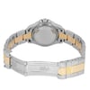 An image of a pre-owned wristwatch showcasing the back view with an open clasp. The watch features a two-tone metal strap in silver and gold, with the brand logo visible on the clasp. The photograph is taken from a close distance, capturing the watch at eye level, focusing on the back case and bracelet links.