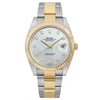 An image of a pre-owned wristwatch, captured from a full frontal view. The watch features a two-tone metal bracelet with gold and silver links. Its dial is adorned with diamond hour markers and a date window at the 3 o'clock position. The bezel is gold-toned with a fluted design, and it is photographed at a close distance, highlighting its intricate details.