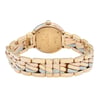 An image of a pre-owned Cartier women's wristwatch, shown from the back view with a close clasp. The watch features a round case and a screwback, both made of a combination of rose gold, white gold, and yellow gold, creating a tri-color pattern. The band is also composed of these three gold types, articulated in a brick-like design. The closure is a butterfly clasp. The image is taken at a close distance, capturing the watch in a straight-on angle that highlights the back of the case and the clasp in detail.