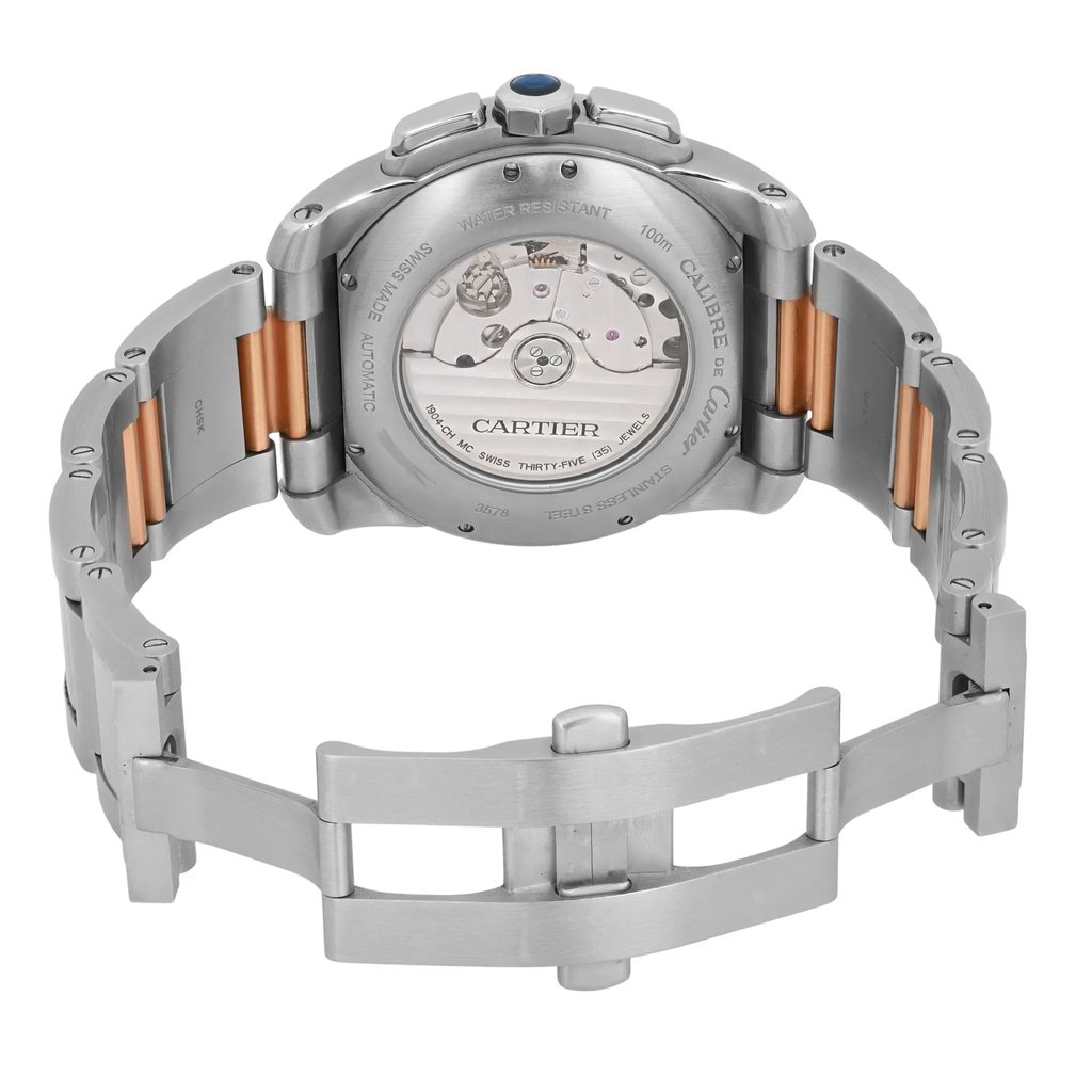 An image of a pre-owned Cartier men's wristwatch, viewed from the back at a slight angle, showcasing the transparent case back and the intricate movement inside. The watch has a stainless steel band with rose gold accents, and the clasp is open. The watch features include a chronograph, date indicator, and luminous hands. The image is taken from a close distance, highlighting the detailed craftsmanship.