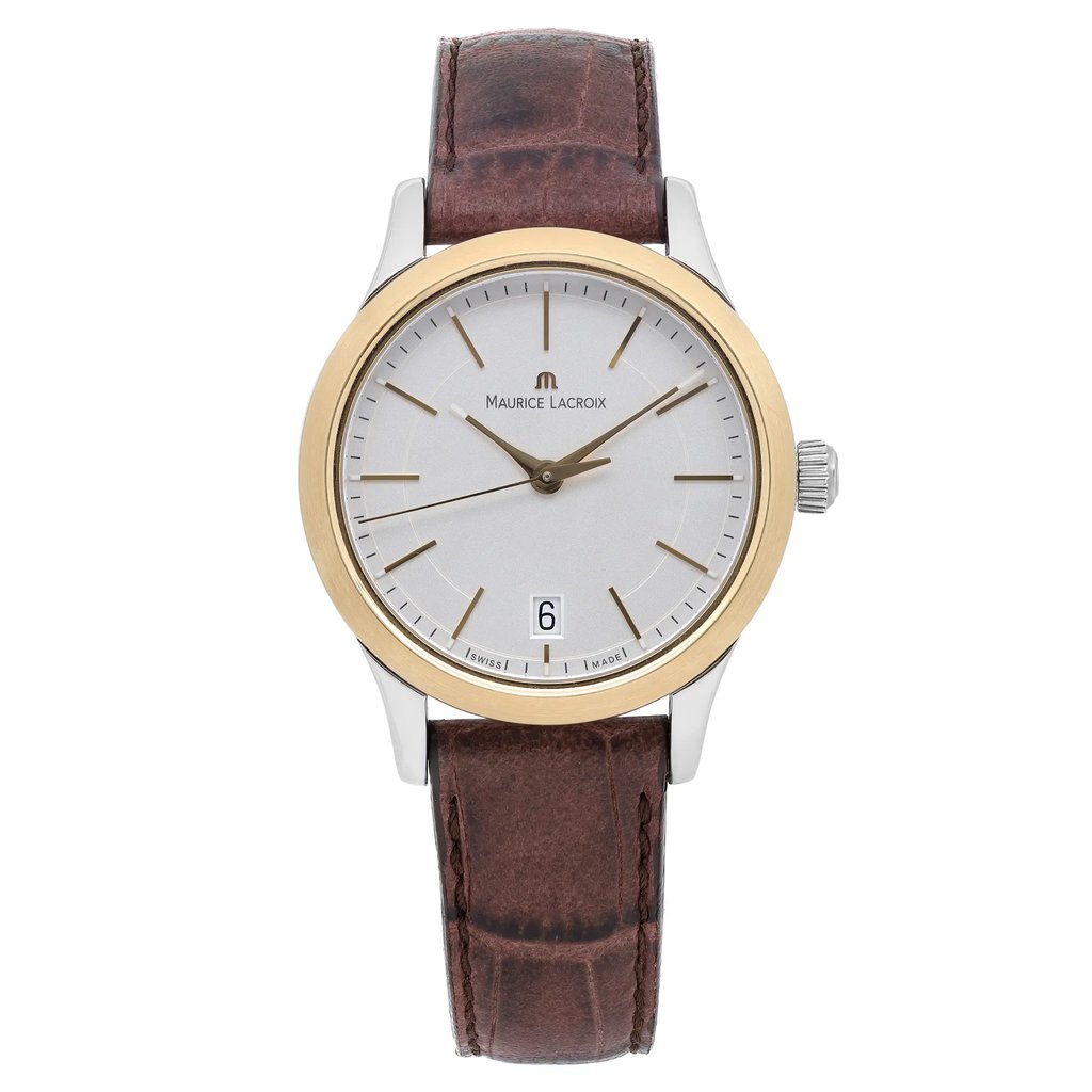 An image of a Wristwatch by Maurice Lacroix. This Unworn item is designed for Women, featuring a Casual style. It has a Quartz movement and an Analog display with a Silver dial color. The indices include 12-Hour Dial,Non-Numeric Hour Marks,Stick Indexes. The band is made of Leather and the case is made of Stainless Steel. The watch has a Round shape with a case size of 33 mm and a case thickness of 8 mm.