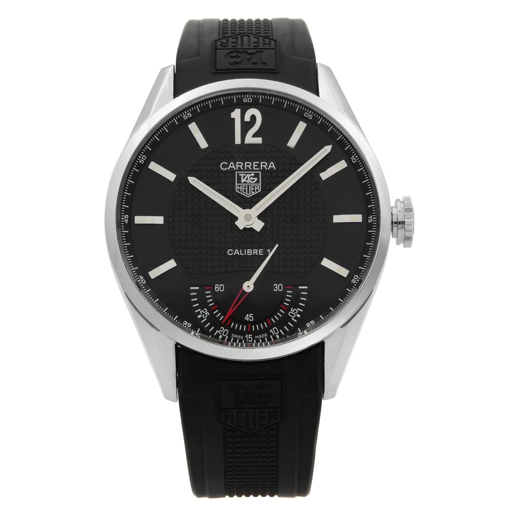 An image of a Wristwatch by TAG Heuer. This Pre Owned item is designed for Men, featuring a Sport style. It has a Mechanical (Manual) movement and an Analog display with a Black dial color. The indices include Non-Numeric Hour Marks,Seconds Hand. The band is made of Rubber and the case is made of Stainless Steel. The watch has a Round shape with a case size of 44 mm and a case thickness of 12 mm.