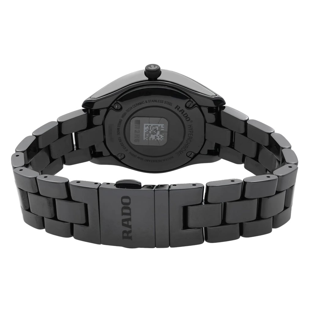 An image of a wristwatch displayed from the back view, showcasing the close clasp. The watch is positioned to highlight its sleek, dark metallic bracelet and detailed engravings on the case back. The angle captures the full length of the bracelet, focusing on the brand name engraved on the clasp. The image is taken at a close distance, emphasizing the watch's polished finish and sophisticated design.