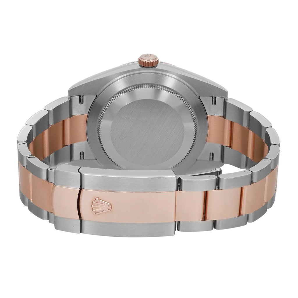 An image of a men's Rolex wristwatch, displayed as a back view with a close clasp. The watch is shown from a direct rear angle and occupies the central portion of the image. Its case material is stainless steel with a screwback design, and the band is made of alternating links of rose gold and stainless steel. The round shape of the watch case is visible, and the fold-over clasp is securely fastened. The photograph appears to be a close-up, highlighting the watch's details and surface textures. The condition is that of a display model, indicating no signs of wear.
