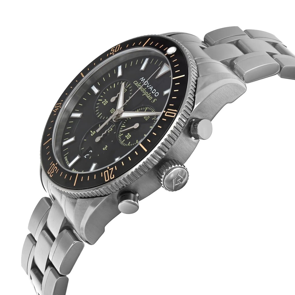 An image of a pre-owned wristwatch shown from a side profile view, highlighting the crown and buttons. The watch features a stainless steel bracelet and a black dial with multiple subdials. The angle captures the depth and details of the bezel and casing, providing a clear view of the watch's design elements from a close distance.