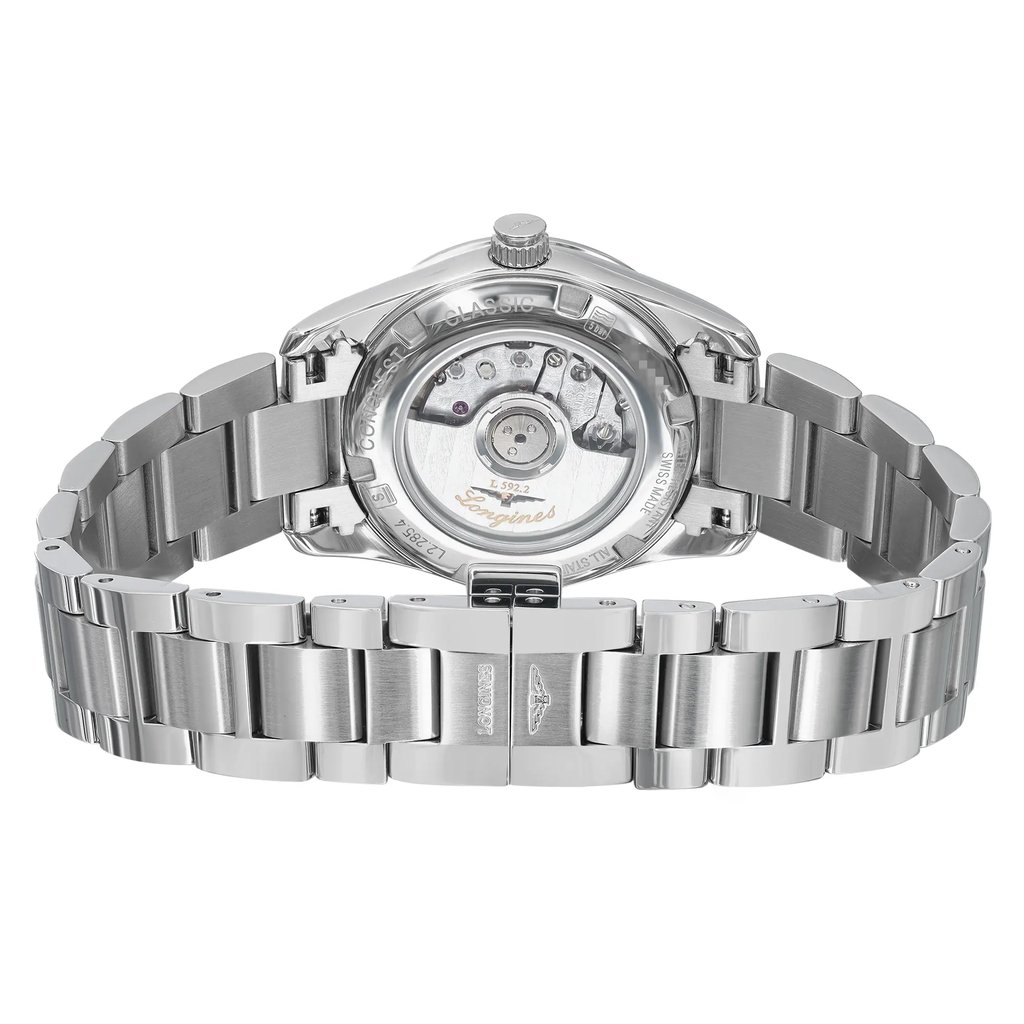 An image of a Wristwatch by Longines. This Display Model item is designed for Women, featuring a Dress/Formal style. It has a Mechanical (Automatic) movement and an Analog display with a Silver dial color. The indices include 12-Hour Dial,Arabic Numerals,Stick Indexes. The band is made of Stainless Steel and the case is made of Stainless Steel. The watch has a Round shape with a case size of 29.5 mm and a case thickness of 10 mm.
