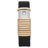 An image of a pre-owned wristwatch shown from a front full frontal view. The watch features a unique design with a series of gold-toned, ribbed rings encircling the central case. The face of the watch is minimalistic with a small square diamond and the brand name visible. The watch is positioned vertically, emphasizing its elegant and streamlined appearance, with a black strap extending above and below the central case.