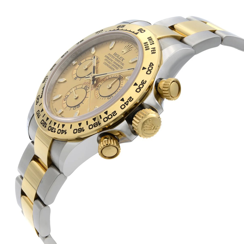 An image of a pre-owned men's luxury Rolex wristwatch, shown from a side profile view with the crown prominently visible. The watch features a round shape with a champagne dial and gold bezel. The band is a combination of stainless steel and yellow gold, matching the case made of stainless steel. The watch includes features like a chronograph, luminous hands, and a small seconds subdial. The angle highlights the watch’s elegant design and craftsmanship, captured from a close distance.