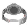 An image of a wristwatch viewed from the back, showcasing its open clasp. The watch is positioned centrally, with the angle focusing on the rear casing and the bracelet. The distance is close enough to highlight the details and engravings on the back, emphasizing the unworn condition of the watch.