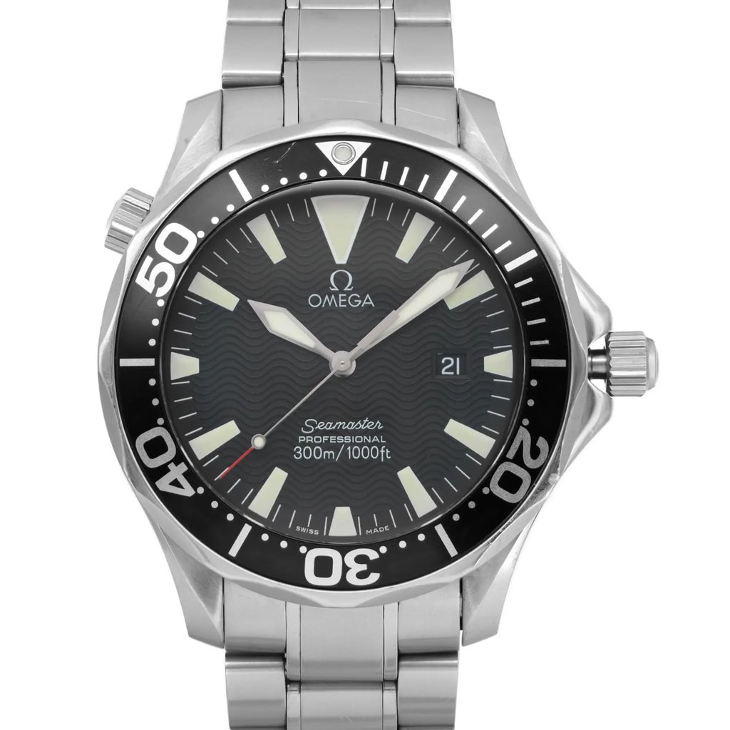 An image of a pre-owned wristwatch, featuring a front close-up shot of the watch face. The watch has a stainless steel bracelet and a black dial with bold white hour markers and hands. The bezel is marked for diving, and the brand name is visible on the face. The watch is positioned centrally in the frame, highlighting its design and details.
