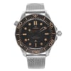 An image of a men's OMEGA wristwatch, luxury style, with a front full frontal view. The display model is in excellent condition, featuring a round titanium case and a titanium band with a textured design. It has a black dial and black bezel, with non-numeric hour marks and 12-hour dial indices, complemented by luminous hands. The Omega logo and "Seamaster" text are visible on the dial, along with the words "CO-AXIAL MASTER CHRONOMETER 300m / 1000ft" indicating its water resistance. The image is a close-up, capturing the watch face and a portion of the band, providing a clear view of the watch's features.