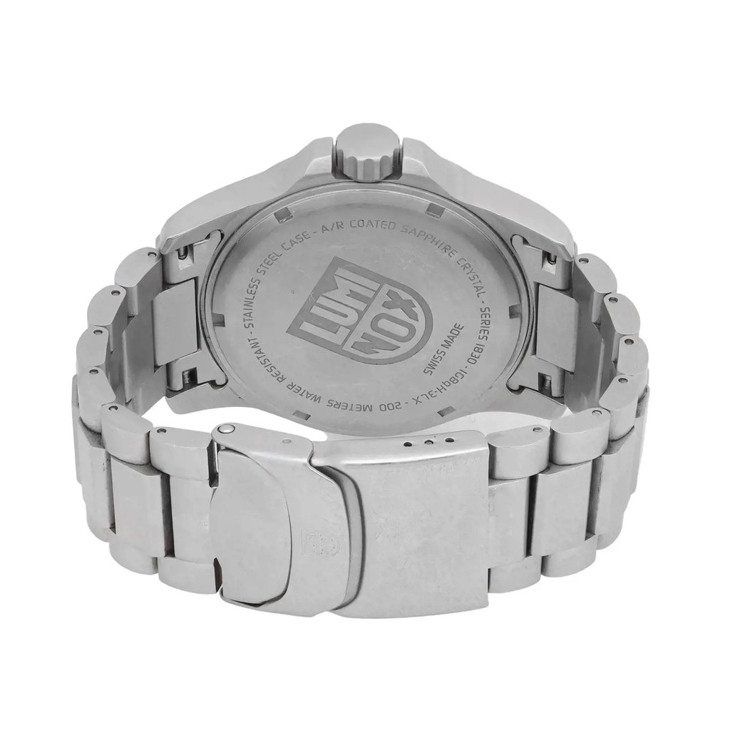 An image of a Wristwatch by Luminox. This Pre Owned item is designed for Men, featuring a Dress/Formal style. It has a Quartz movement and an Analog display with a Black dial color. The indices include 12-Hour Dial,Non-Numeric Hour Marks,Stick Indexes. The band is made of Stainless Steel and the case is made of Stainless Steel. The watch has a Round shape with a case size of 42 mm and a case thickness of 11 mm.