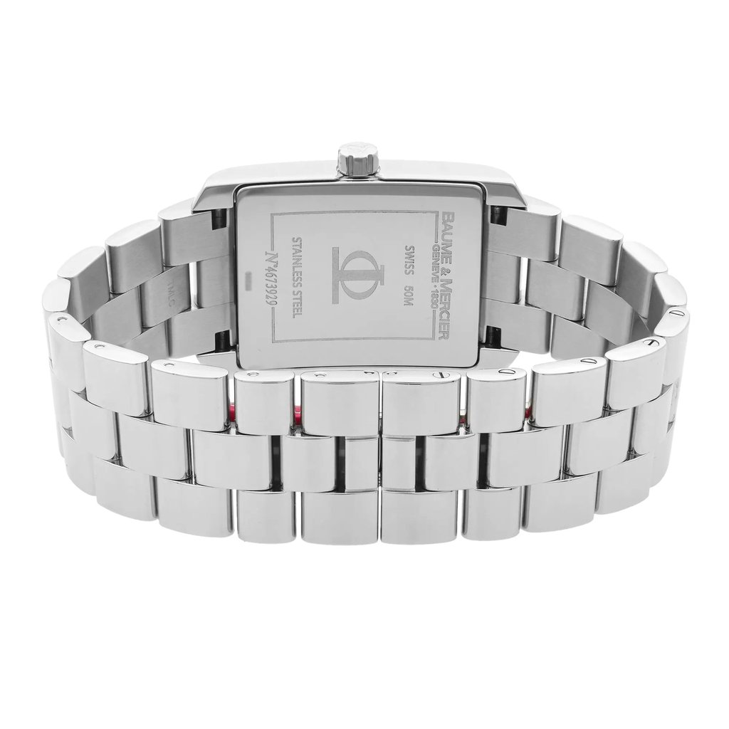 An image of a wristwatch showcasing the back view with a focus on the closed clasp. The watch is positioned upright, capturing the stainless steel bracelet and the engraved details on the back of the case. The angle is slightly elevated, taken at a close distance, highlighting the sleek design and polished finish typical of a display model.