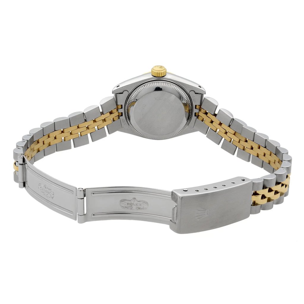 An image of a pre-owned women's Rolex wristwatch, viewed from the back at a slight angle. The watch features a two-tone bracelet with stainless steel and gold links. The clasp is partially open, and the back of the watch case is visible, showcasing the crown on top. The photograph is taken at a close distance, highlighting the details of the bracelet and clasp.