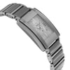 An image of a pre-owned Rado men's wristwatch in a casual style, presented in a side profile view opposite of the crown. The watch has a rectangle shape with a silver dial featuring a diamond pattern, complemented by a silver bezel. It is constructed from ceramic and stainless steel materials for both the case and the band. The watch is positioned diagonally across the frame, with a medium distance from the viewpoint, showing minor signs of wear and a hairline scratch on the bezel.