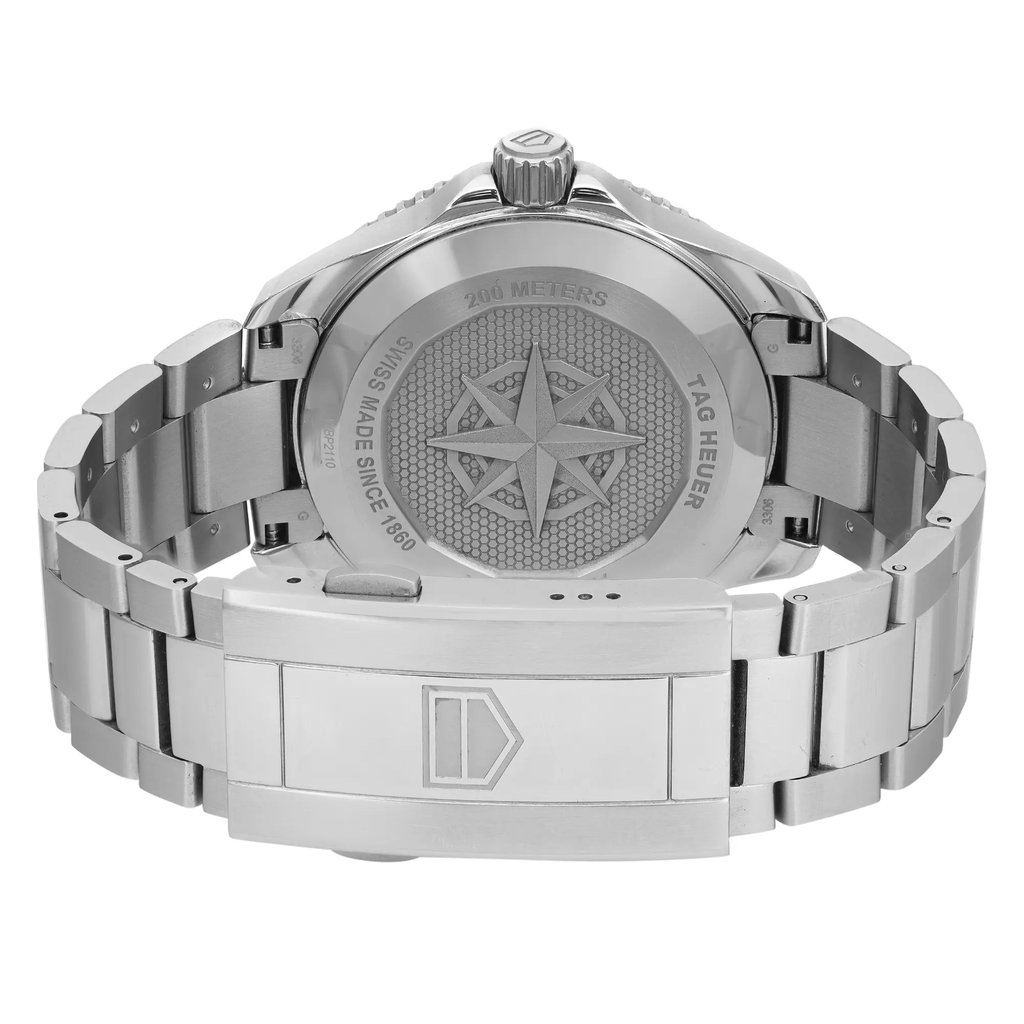 An image of a Wristwatch by TAG Heuer. This Pre Owned item is designed for Men, featuring a Casual style. It has a Mechanical (Automatic) movement and an Analog display with a Black dial color. The indices include 12-Hour Dial,Stick Indexes. The band is made of Stainless Steel and the case is made of Stainless Steel. The watch has a Round shape with a case size of 40 mm and a case thickness of 10 mm.