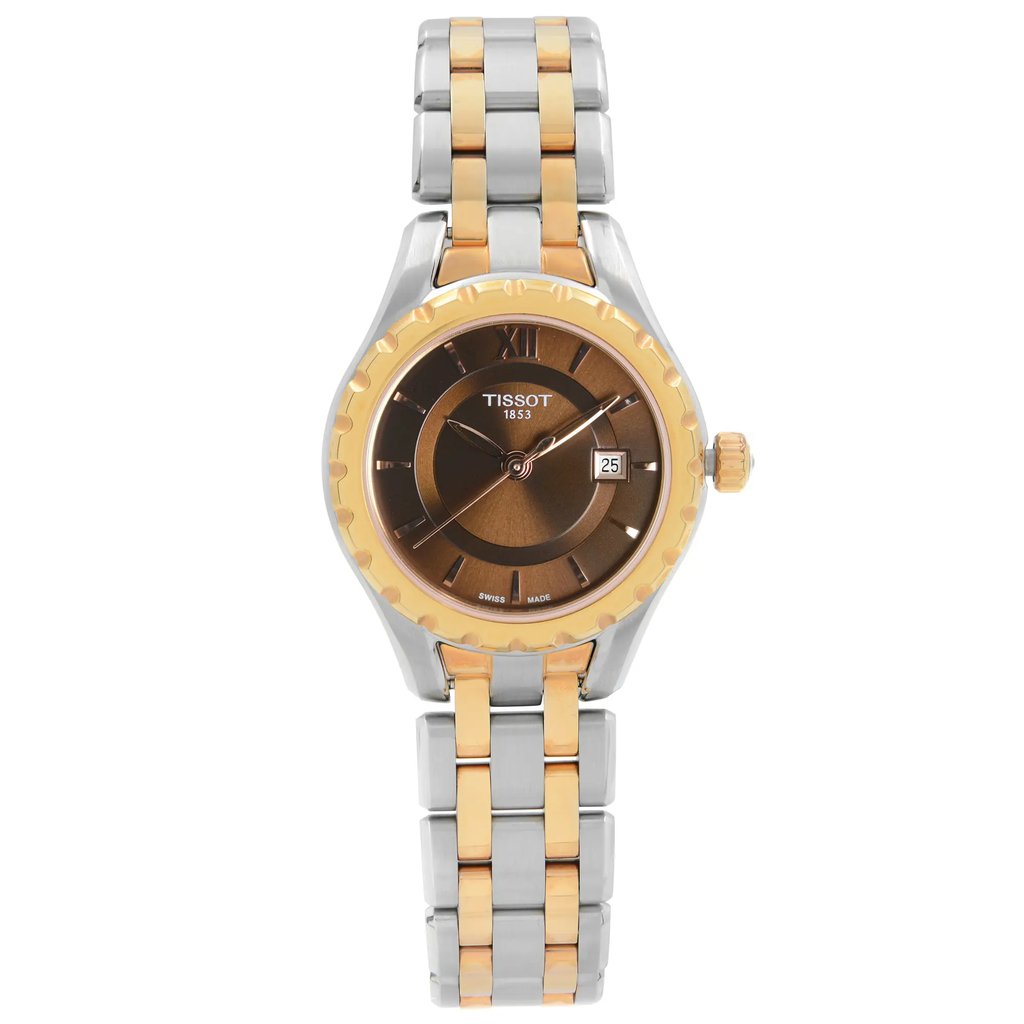 An image of a Wristwatch by Tissot. This Pre Owned item is designed for Women, featuring a Dress/Formal style. It has a Quartz movement and an Analog display with a Brown dial color. The indices include Stick Indexes. The band is made of Stainless Steel and the case is made of Stainless Steel. The watch has a Round shape with a case size of 28 mm and a case thickness of 9 mm.
