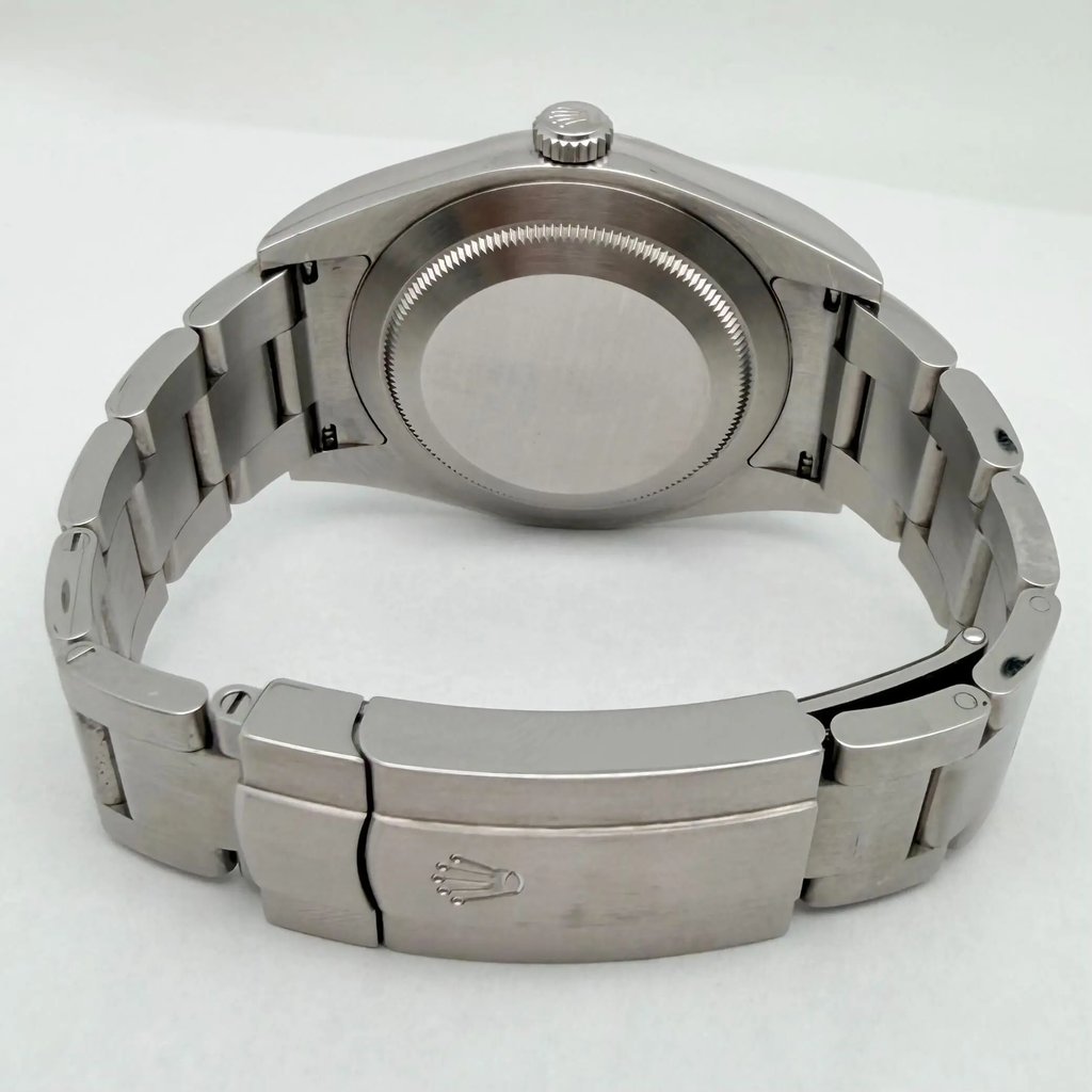 Back View Of Screwback Back Case And Closed Stainless Steel Band Of Rolex 114300 Watch Pre Owned Condition